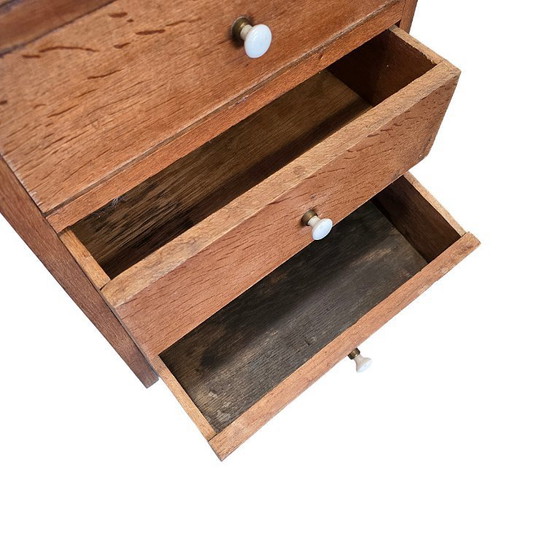Image 1 of Antique narrow oak chest of drawers, from the early 20th century