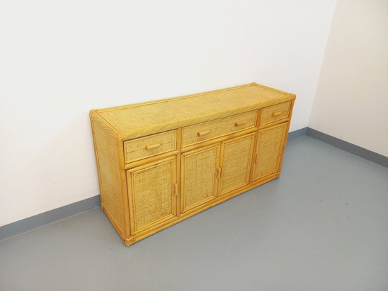 Image 1 of Vintage dressoir/opbergmeubel van rotan en gevlochten rotan uit de jaren 70.