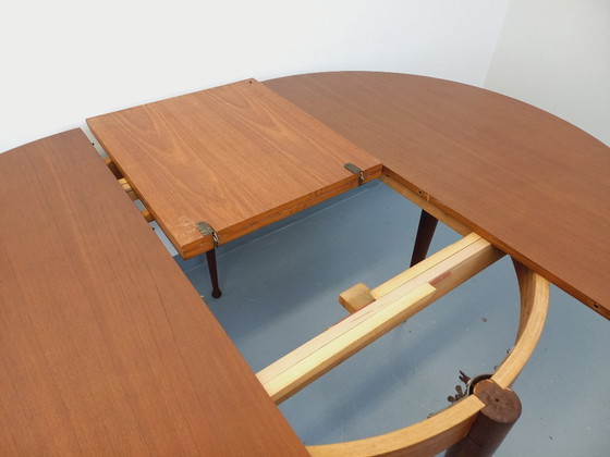 Image 1 of Vintage Scandinavian style round teak dining table from the 1950s/60s with extension