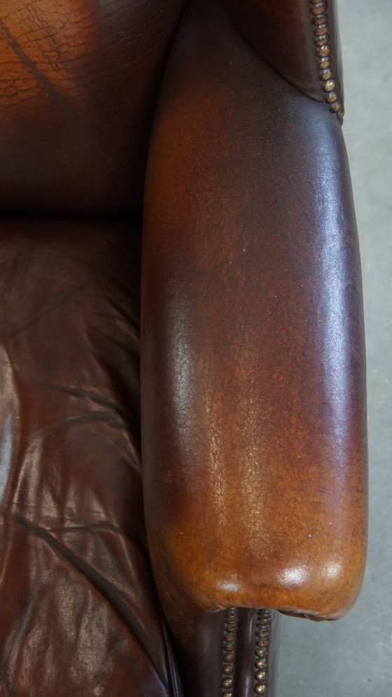 Image 1 of Donkere Engelse stijl schapenleren oorfauteuil