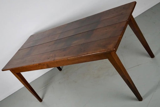 This French console table was designed and made around the end of the 19th century from marble and cast iron. The table is in