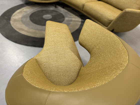 Image 1 of Leolux Parabolica Draai Fauteuil Mondo stof Raffino leer 