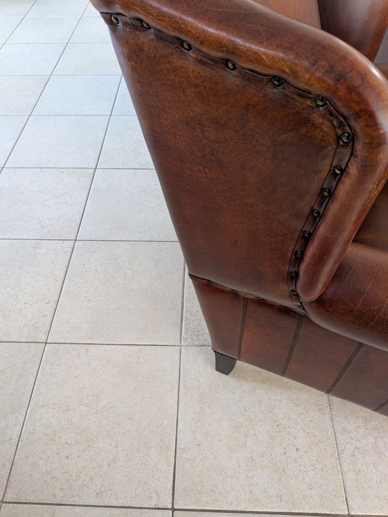A sheepskin leather wingback armchair in very good condition – lounge Atlier, Metal (photo 8 of 10)