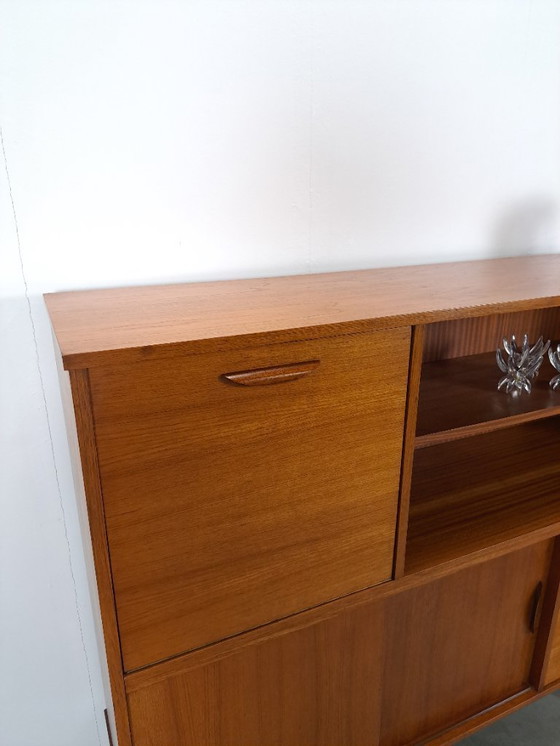 Image 1 of Armario de pared de teca con cajones, barra y patas negras