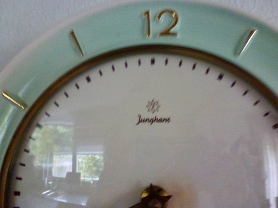 Image 1 of Vintage Junghans wall clock, mint green and gold accents, mid-20th century, Germany