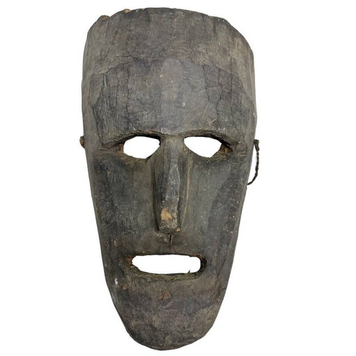 Elongated Hand-carved Wooden Wall Mask from Nepal in Dark Patinated Wood
