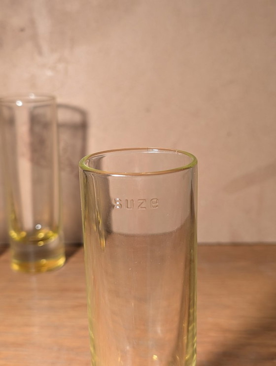 Image 1 of Set van 4 SUZE tubeglazen, geel, van Jean Nouvel