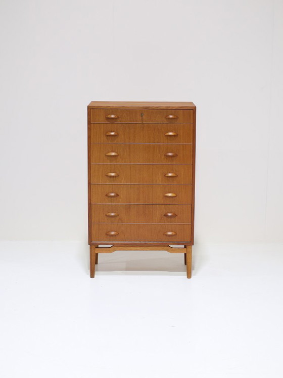 Image 1 of Commode haute étroite en teck avec étagère à chaussures, style danois vintage.