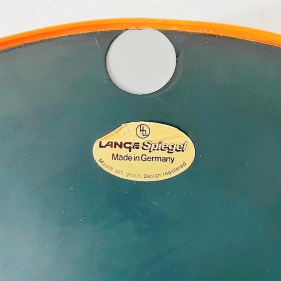 Image 1 of Mid-century Duitse space age spiegel oranje kunststof Lange Germany 1960's