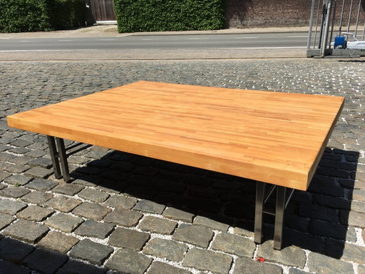 Tavolino da caffè in acciaio inox con piano in legno di faggio