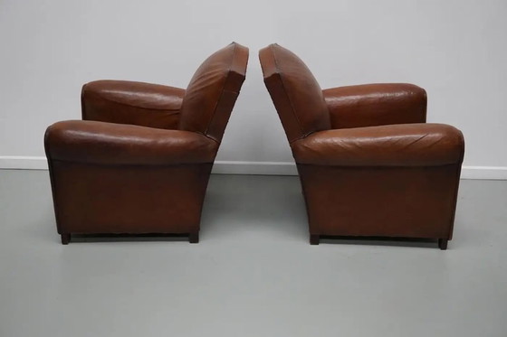 Image 1 of Coppia di poltrone da club francesi in pelle color cognac con schienali a baffo, anni '40