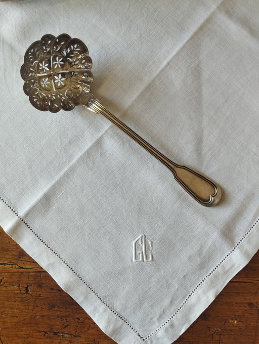 Christofle - Large silver-plated metal sprinkling spoon, filet pattern.