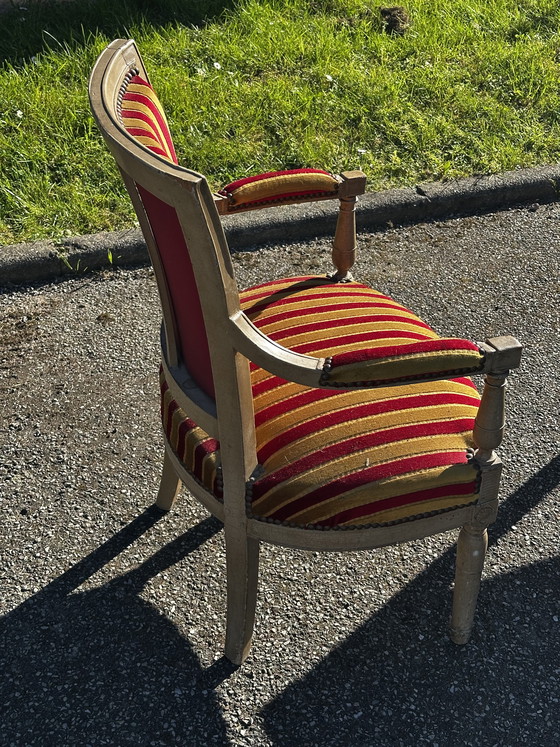 Image 1 of Louis XVI cabrioletfauteuil - Gepatineerd hout en gestreept fluweel