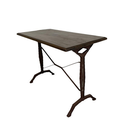 Bistro table with oak top on cast iron frame, 1930s