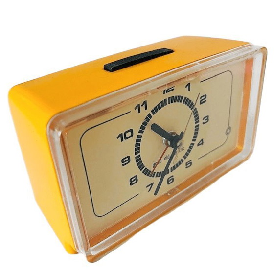 Image 1 of Vintage mid-century electric alarm clock Good-old-Electric plastic yellow 1970s