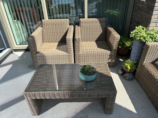 Generous rattan garden set including cushions (2 chairs and table)