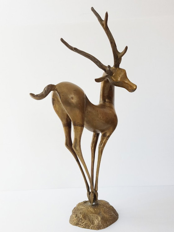 Image 1 of Important dancing stag, antelope, doe, and fawn in gilded brass, 1970s vintage 70s