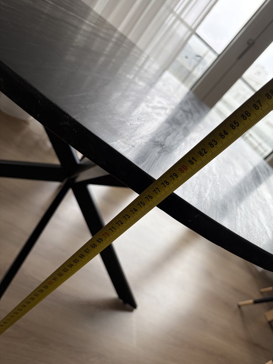 Image 1 of Round marble dining table Ø130 cm – black – design X-leg