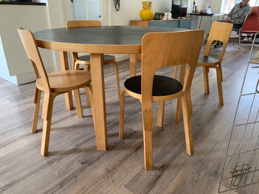 Alvar Aalto dining table with 4 sofas