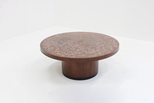 Vintage brutalist round coffee table in copper and wood from the 1970s