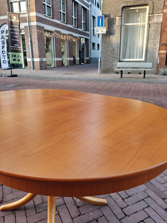 Image 1 of Round extendable dining table