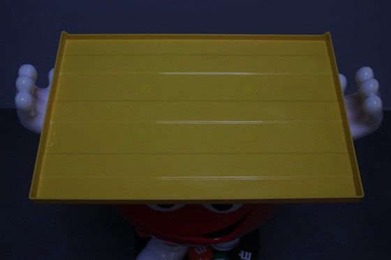 Image 1 of Rarissimo supporto in plastica della mascotte dell'azienda di caramelle M&M's, anni Novanta.