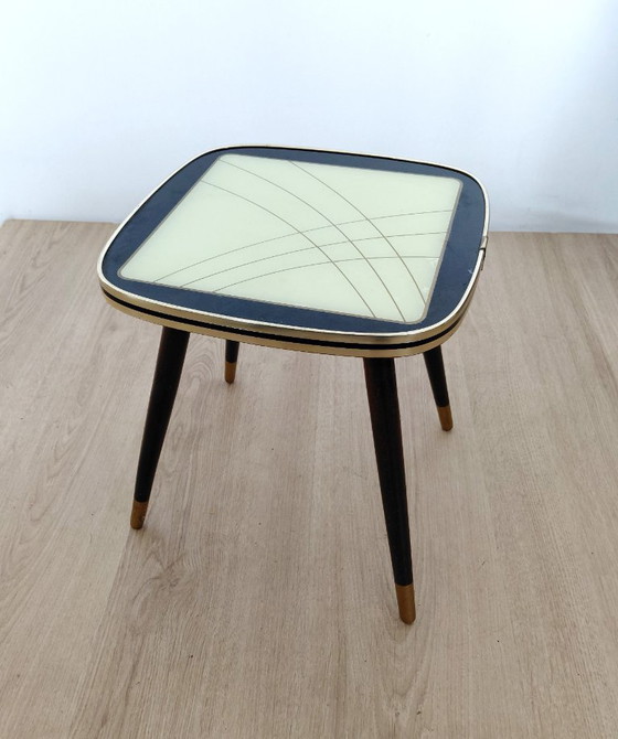 Image 1 of Fifties side table with unusual motif