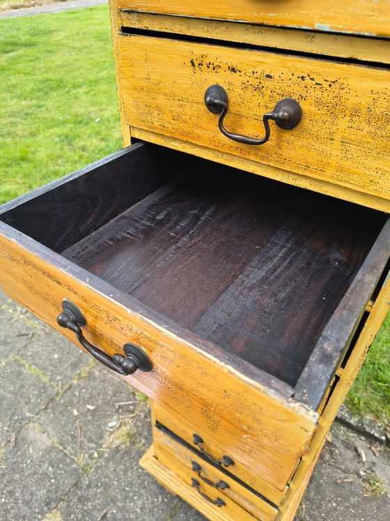 Image 1 of Vintage ochre yellow chest of drawers / apothecary
