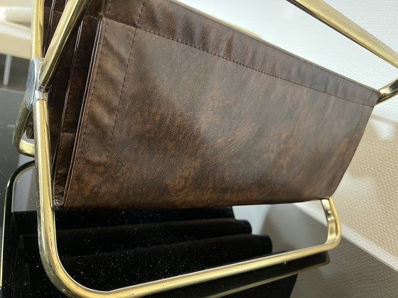 Image 1 of Castelli krantenhouder jaren 60