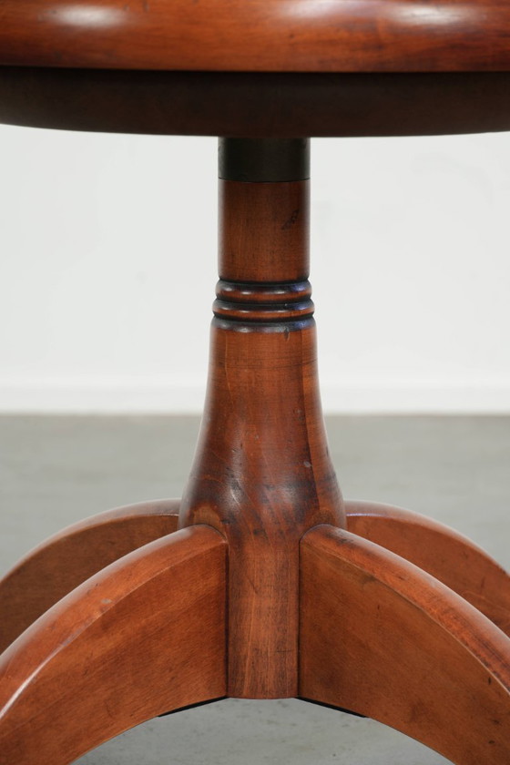 Image 1 of Draaibare Schuitema stoel/ bijzetstoel/ bureaustoel met een cognac kleurige rundleren zitting