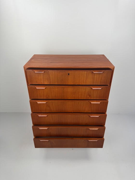 Image 1 of Scandinavian Mid-Century Teak Chest of Drawers – Elegant Sculpted Details