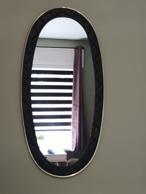 Specchio ovale vintage nero e oro