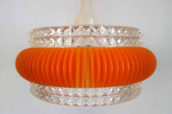 Space age chandelier in transparent plastic with orange 70s strip – Pendant lamps (photo 6 of 12)