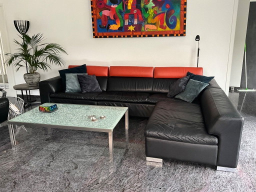 Leolux Howlazy design hoekbank-zwart leer/papaver-aluminium