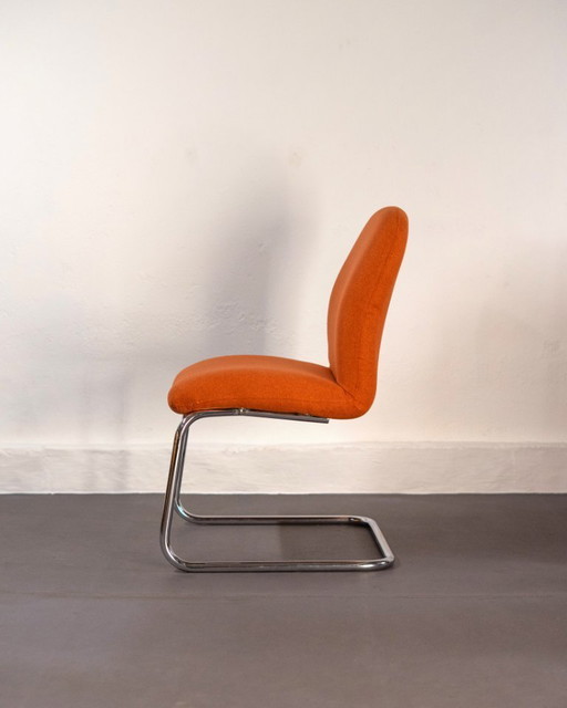 Fauteuil luge en acier tubulaire et tapisserie orange, Allemagne, années 1980