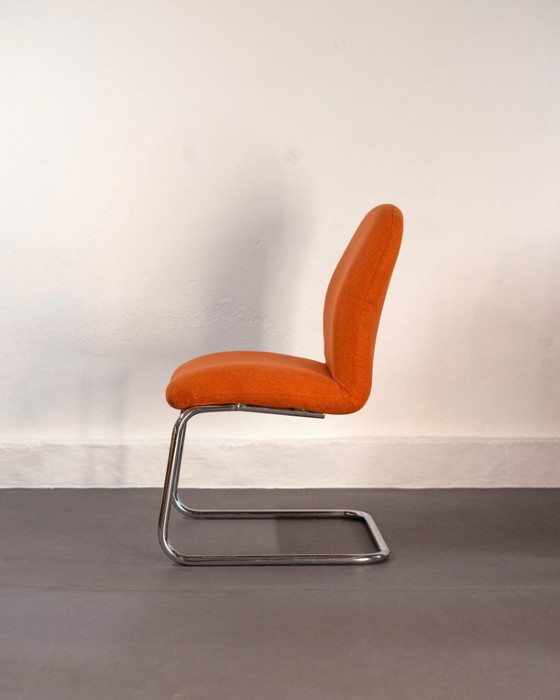 Image 1 of Fauteuil luge en acier tubulaire et tapisserie orange, Allemagne, années 1980