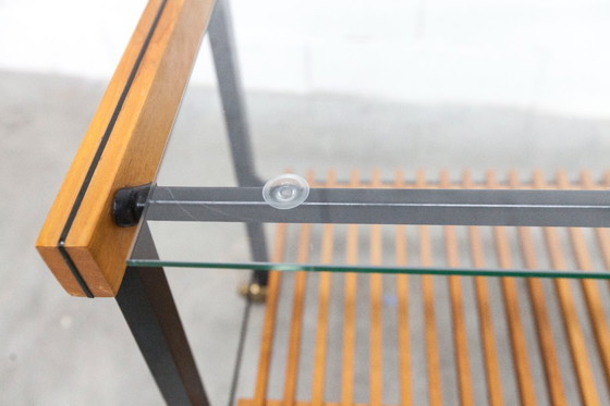 Image 1 of Serveerwagen uit de jaren 60, hifi-kast op wieltjes in teakhout, zwart metaal en glazen blad.