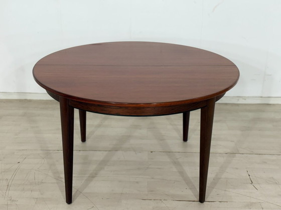 Image 1 of Exclusive vintage rosewood dining table by Omann Junior (model 55) – Extendable