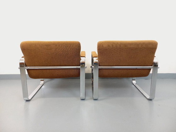 Image 1 of Een paar vintage Eero Aarnio fauteuils voor Framac, uitgevoerd in stof en chroom, uit de jaren 60 en 70.