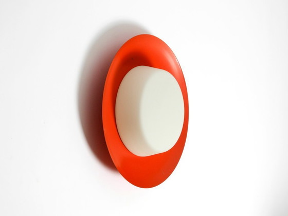 Image 1 of Grote Mid Century wand- of plafondlamp van glas met metalen reflector in rood van Kaiser Leuchten