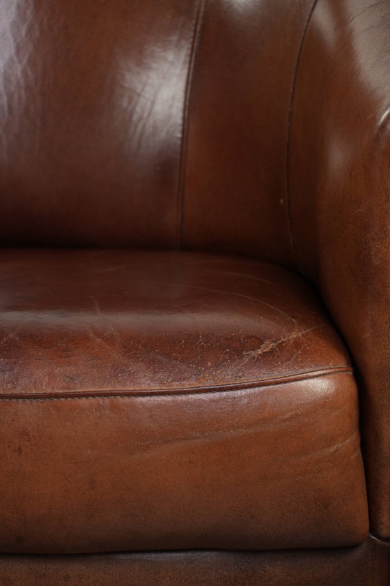 Image 1 of Mooie vintage schapenleren clubfauteuil in Engelse stijl met prachtige diepe kleuren