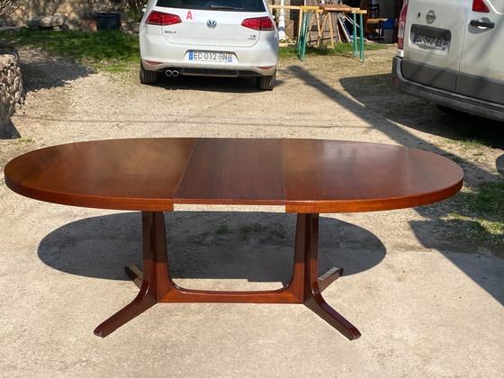 Image 1 of Baumann round oval extendable Scandinavian table in rosewood with 2 extensions, length 166 to 256cm, an60