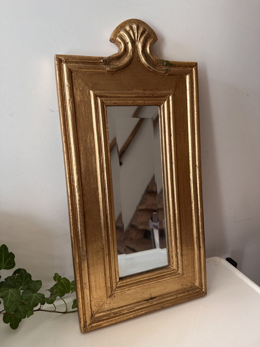 Gold-colored mirror