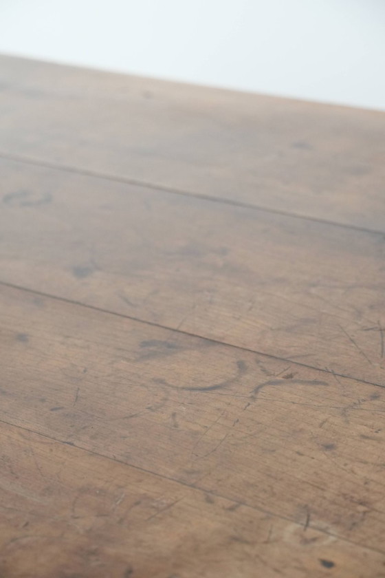 Image 1 of Early 19th century French fruitwood dining table with two drawers