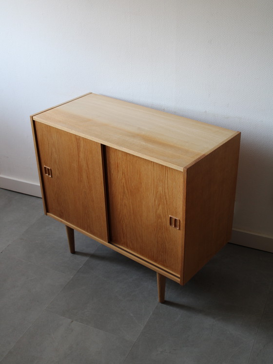 Image 1 of Vintage Danish sliding door cabinet in oak