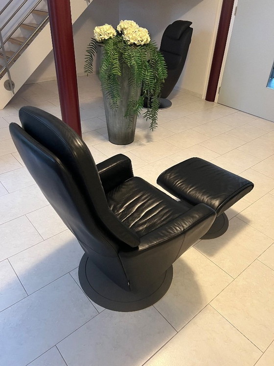 Image 1 of Leather recliner with footrest