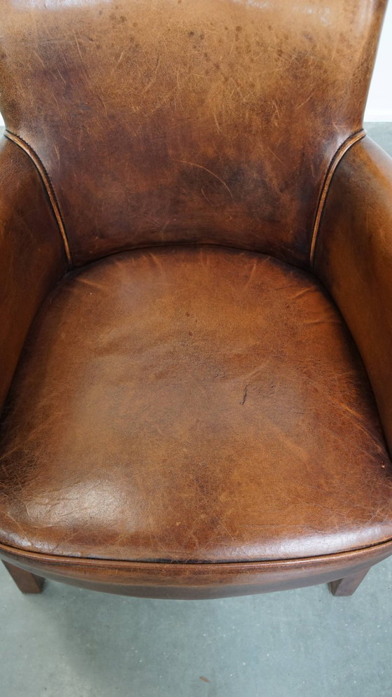 Image 1 of Chaise de salle à manger/de chevet en peau de mouton couleur cognac avec accoudoirs