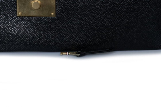 Image 1 of Thom Browne, pochette in pelle martellata con portafoglio