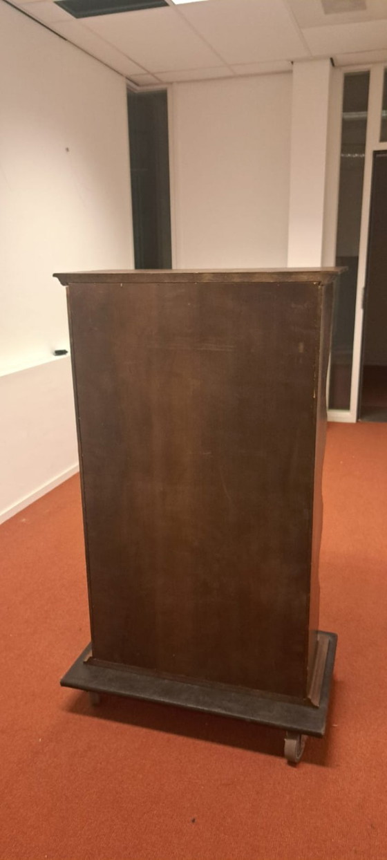 Image 1 of Vintage wooden cabinet with drawers and ribbed edge