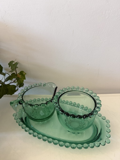Set da zucchero e lattiera in vetro pressato verde smeraldo.